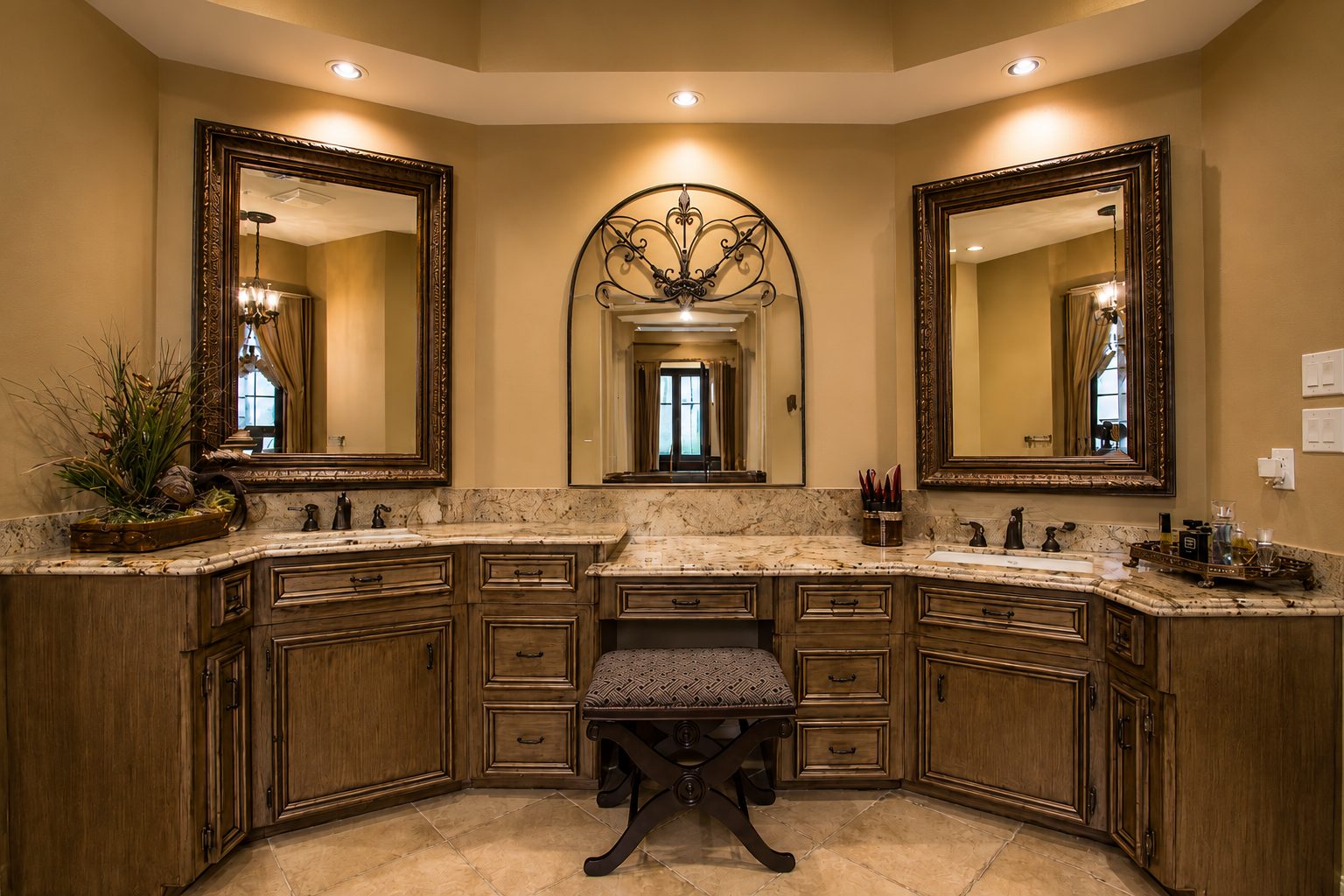 Corner bathroom vanity with twin mirrors and painted cabinets