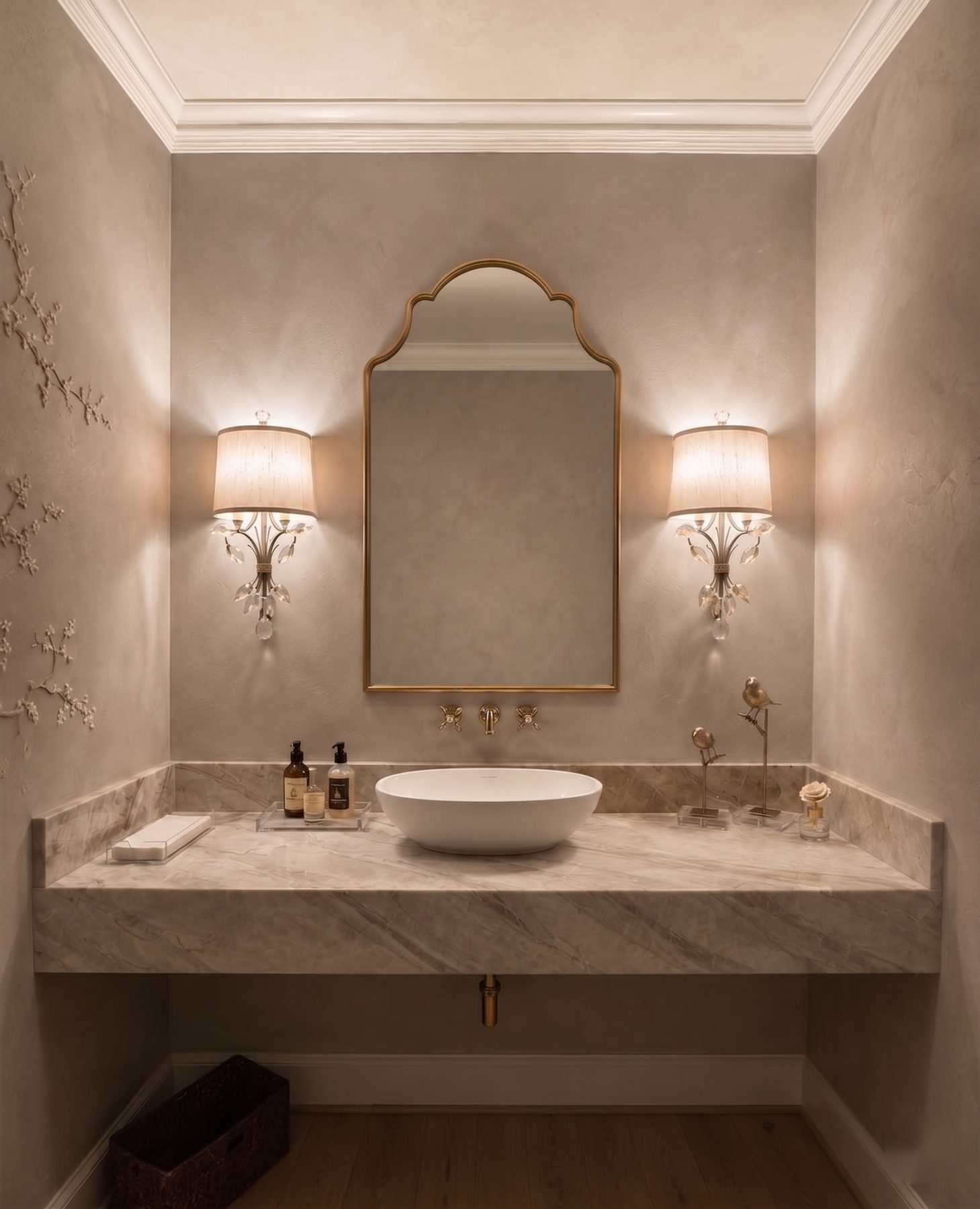 Finished bathroom with decorative plaster walls, sink, and vanity