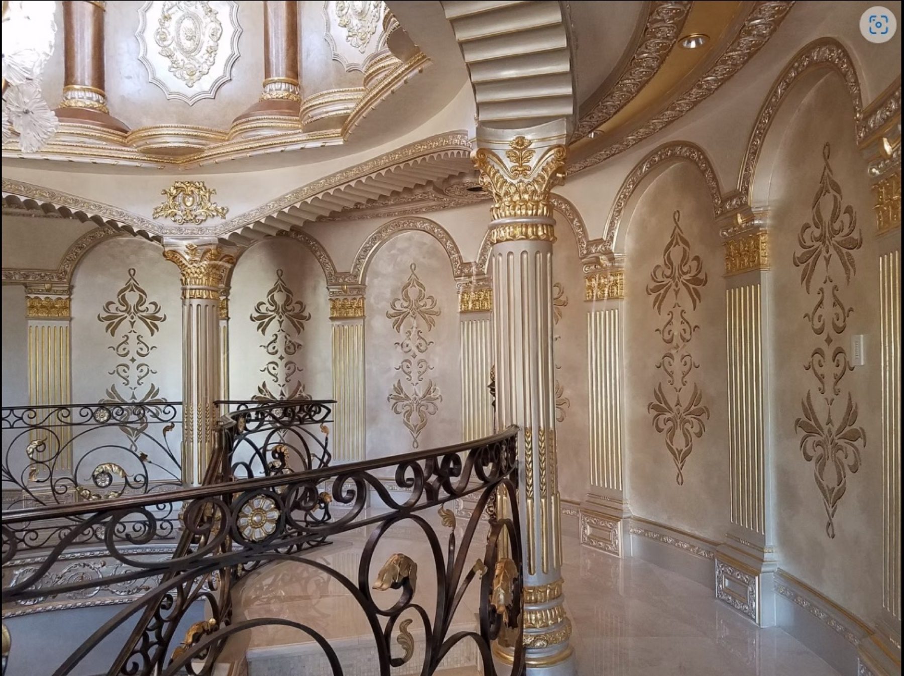 Full room finished by hand with Venetian plaster and painted detail