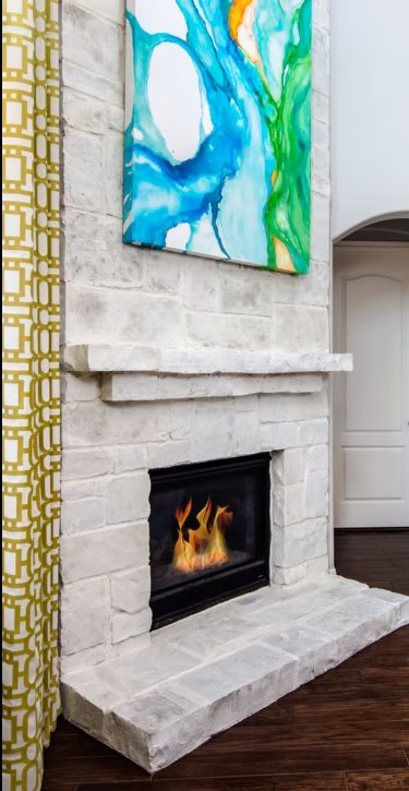 Custom fireplace or range hood finished in decorative plaster, project photo 1