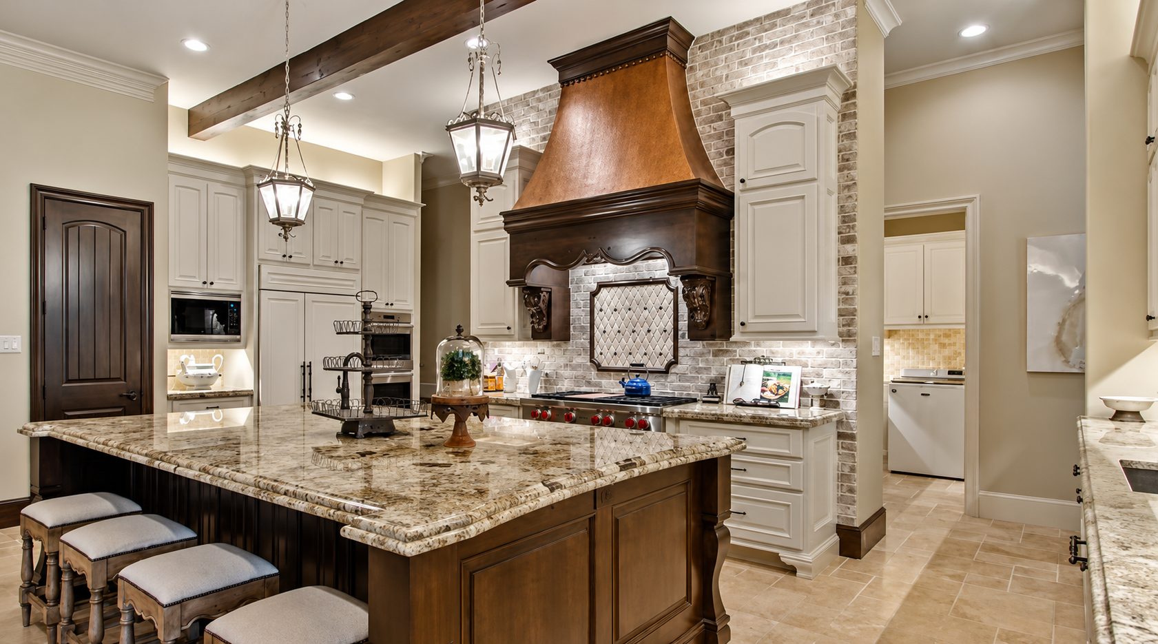 Copper custom range hood in a luxury Houston kitchen