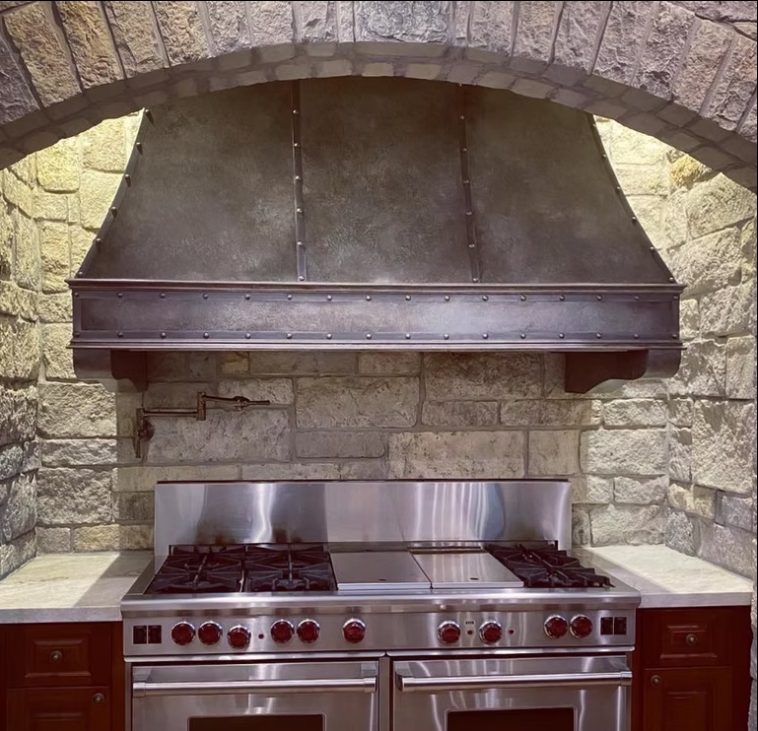 Custom fireplace or range hood finished in decorative plaster, project photo 14