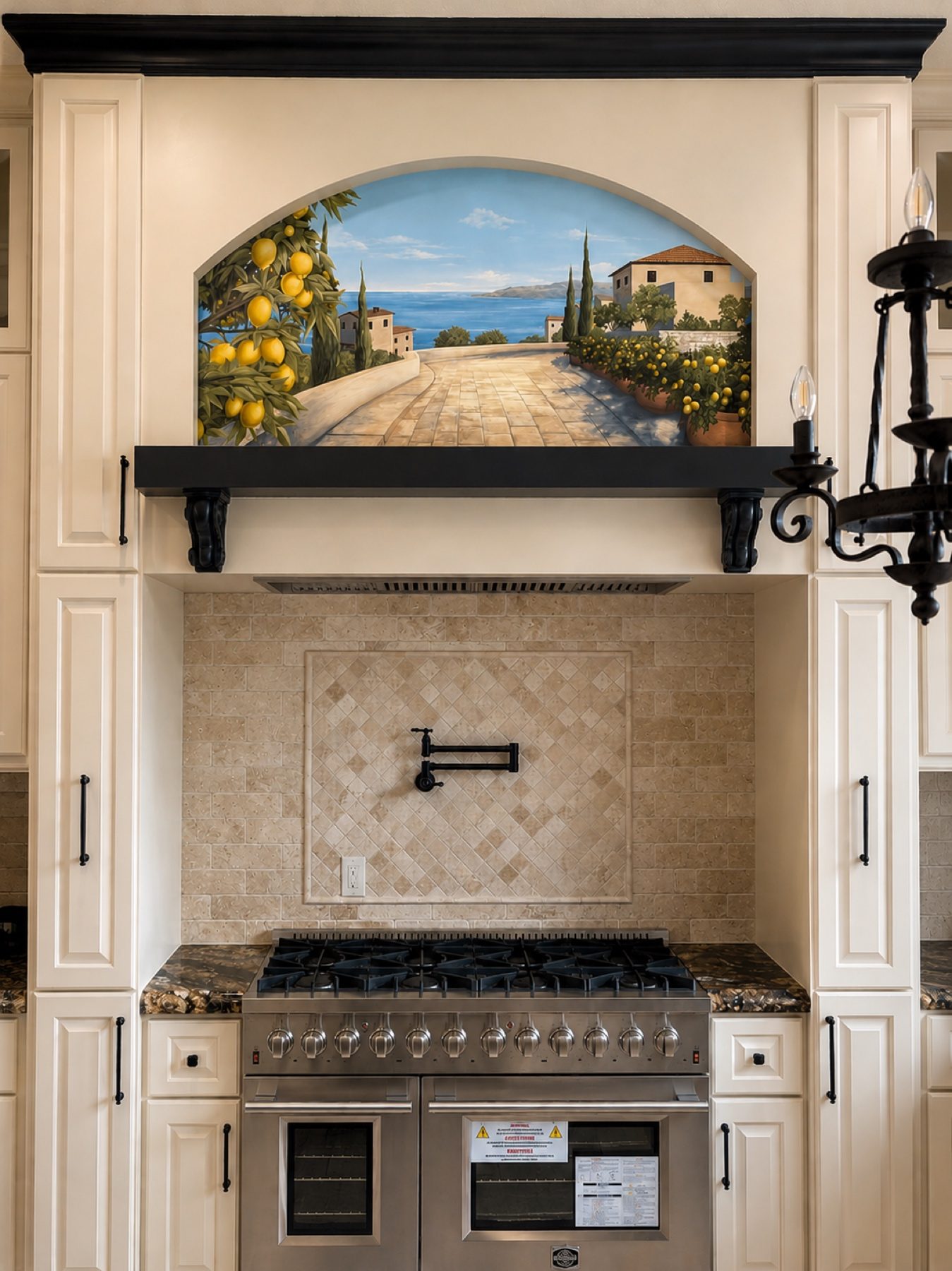 Range hood with a hand-painted Mediterranean lemon grove mural