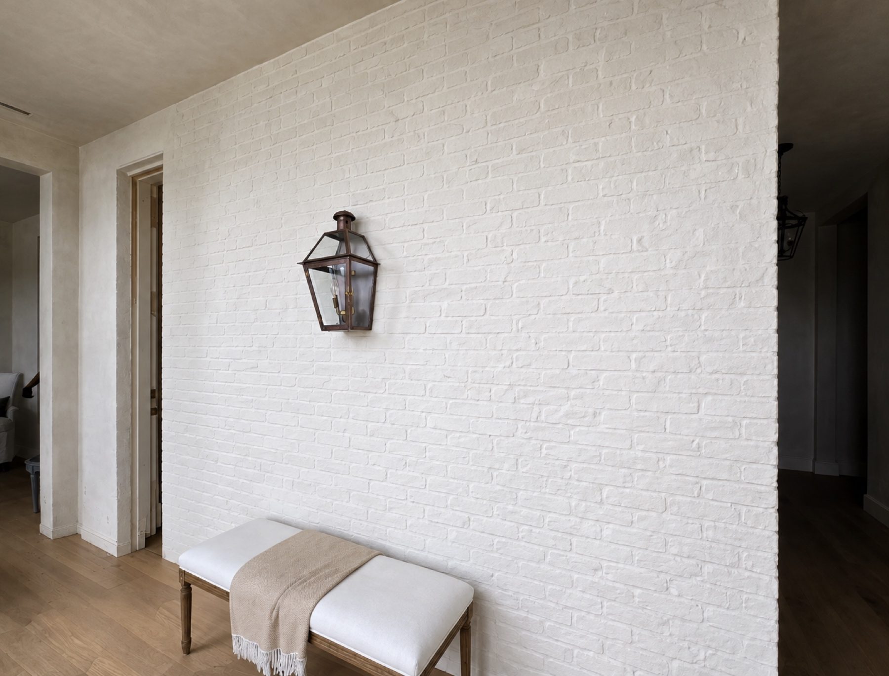 Venetian plaster wall finished by hand and burnished to a soft glow